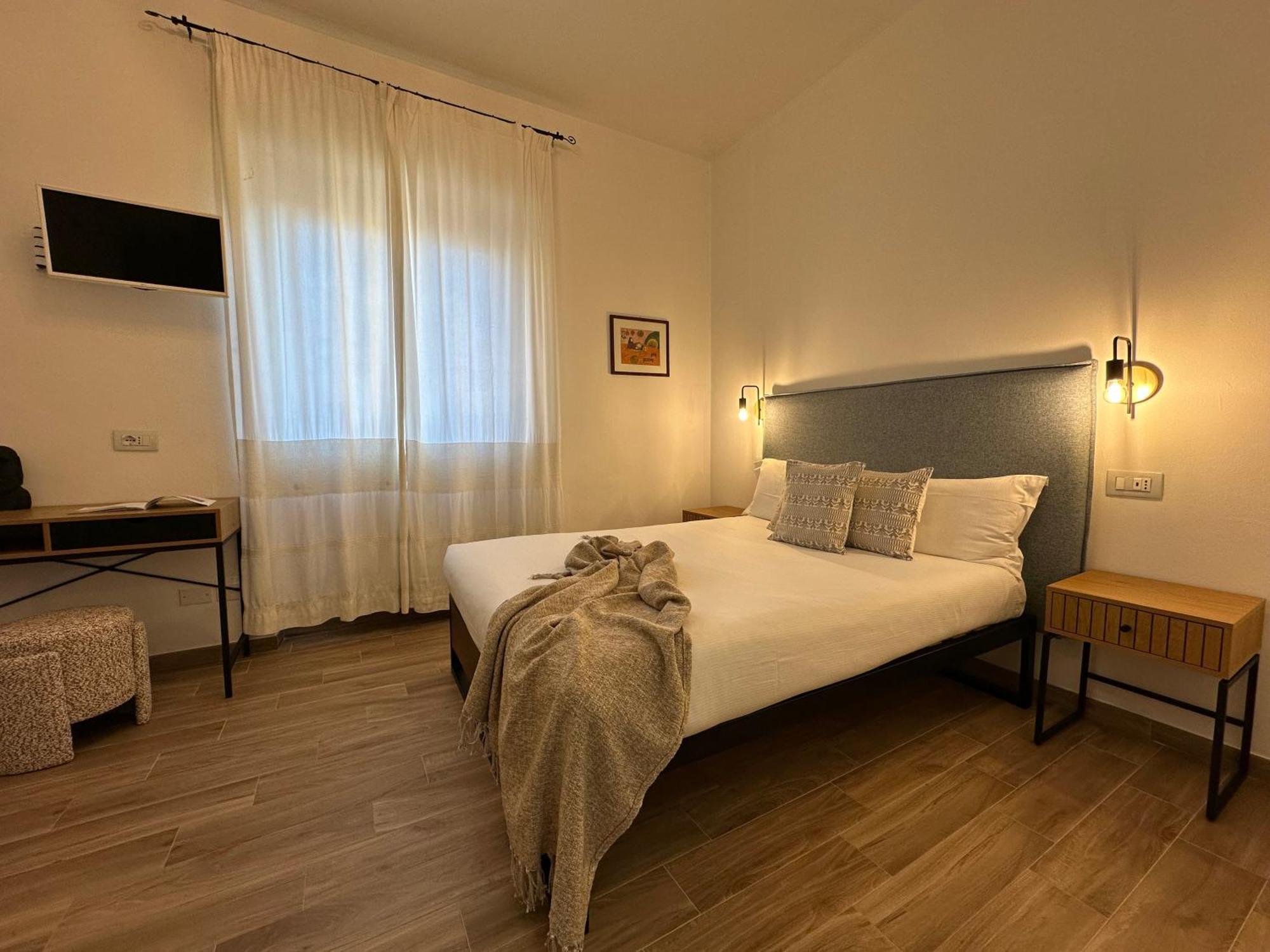 Ng Guest House L'Acquedotto Ольбия Экстерьер фото