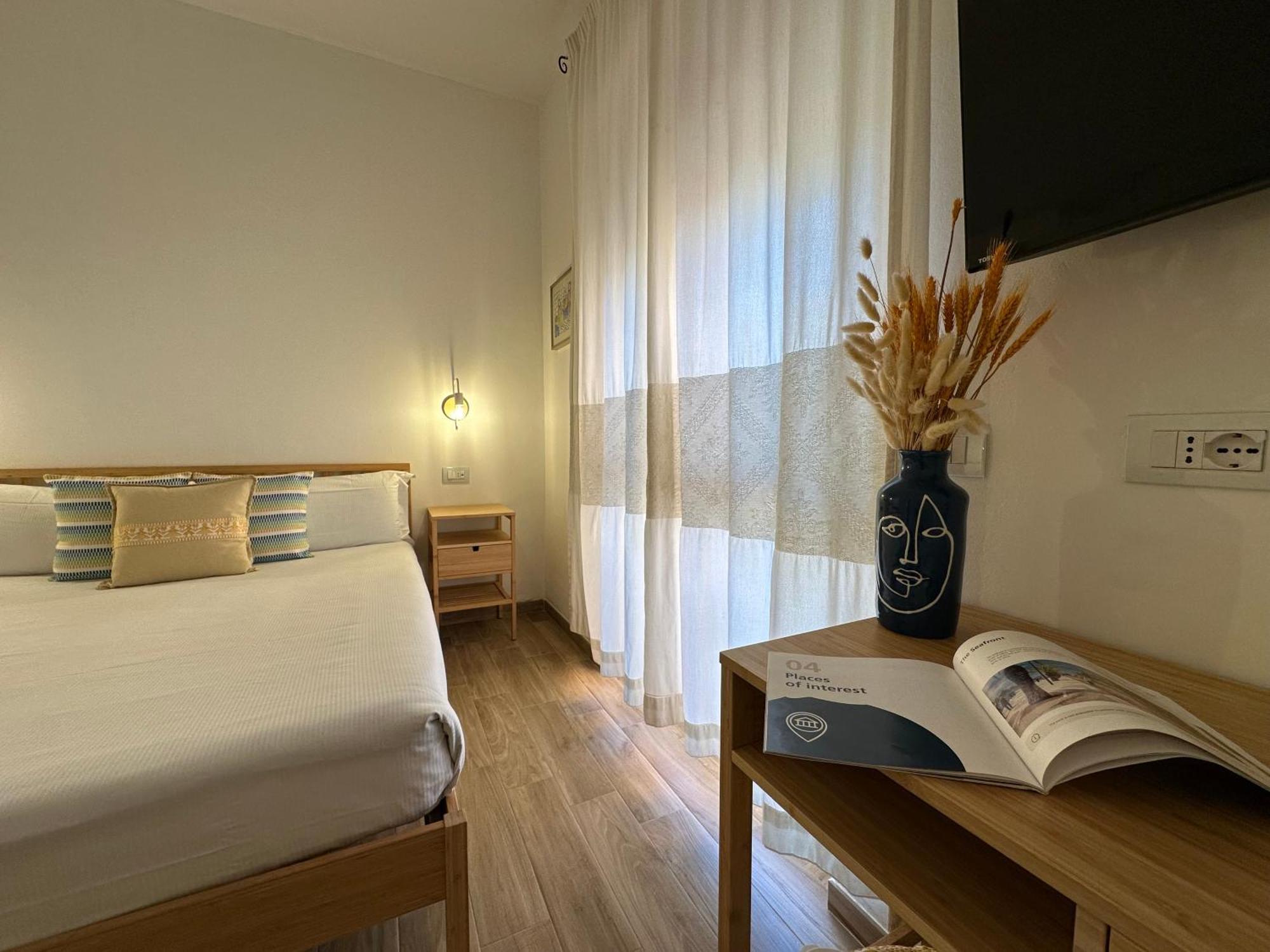 Ng Guest House L'Acquedotto Ольбия Экстерьер фото